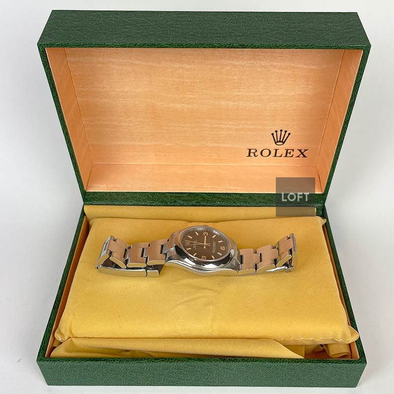 Rolex Oyster Perpetual Midsize 77080 31 mm