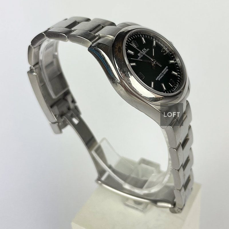 Rolex Oyster Perpetual Midsize 77080 31 mm