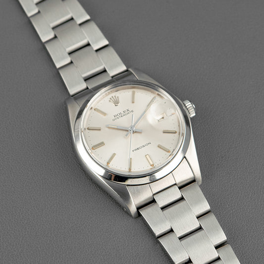 Rolex Oysterdate 6694 Precision Silver Dial 34mm