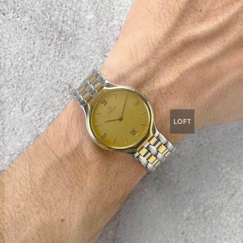 De Ville Symbol Quartz Unisex Acero y Oro 32 mm