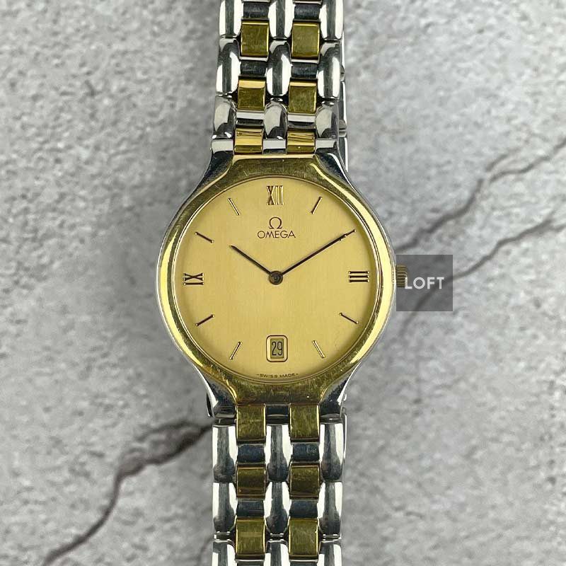 De Ville Symbol Quartz Unisex Acero y Oro 32 mm