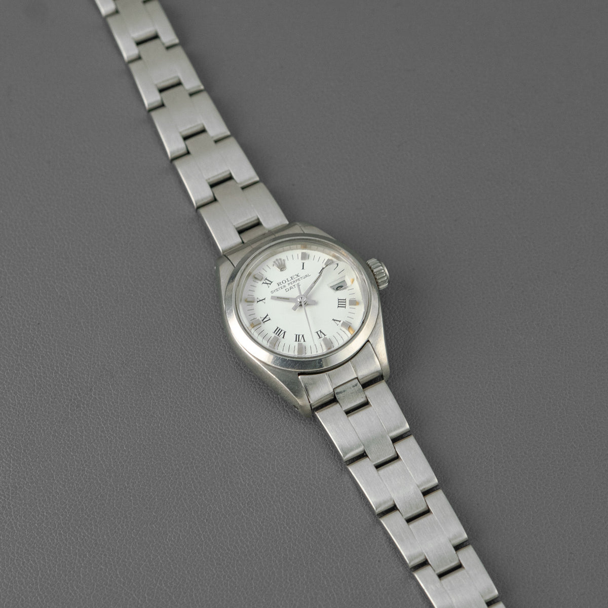 Rolex Oyster Perpetual Date 6916 White Roman Dial 26mm