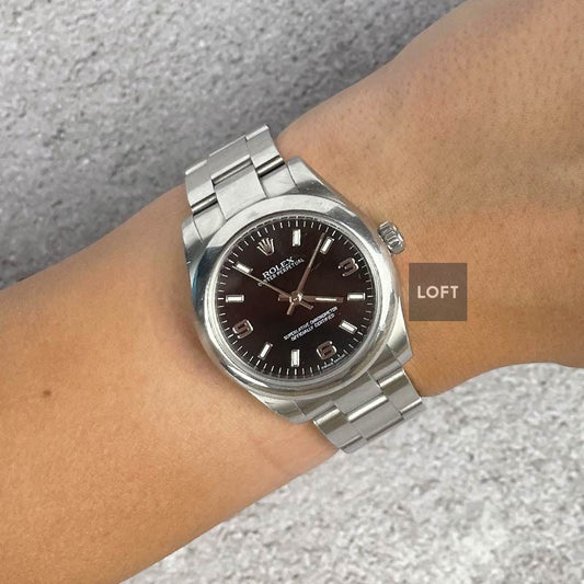 Rolex Oyster Perpetual Midsize 77080 31 mm