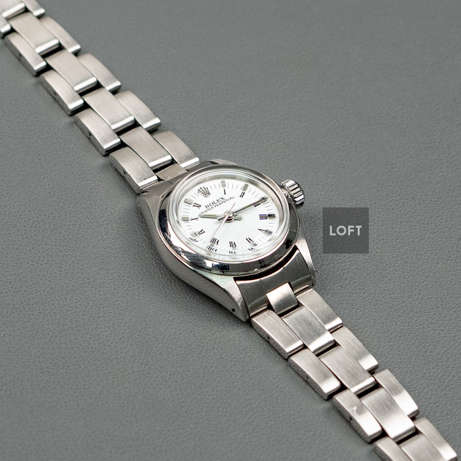 Rolex Oyster Perpetual 6618 Roman White 24mm