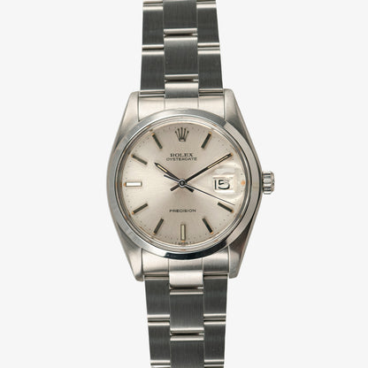 Rolex Oysterdate 6694 Precision Silver Dial 34mm